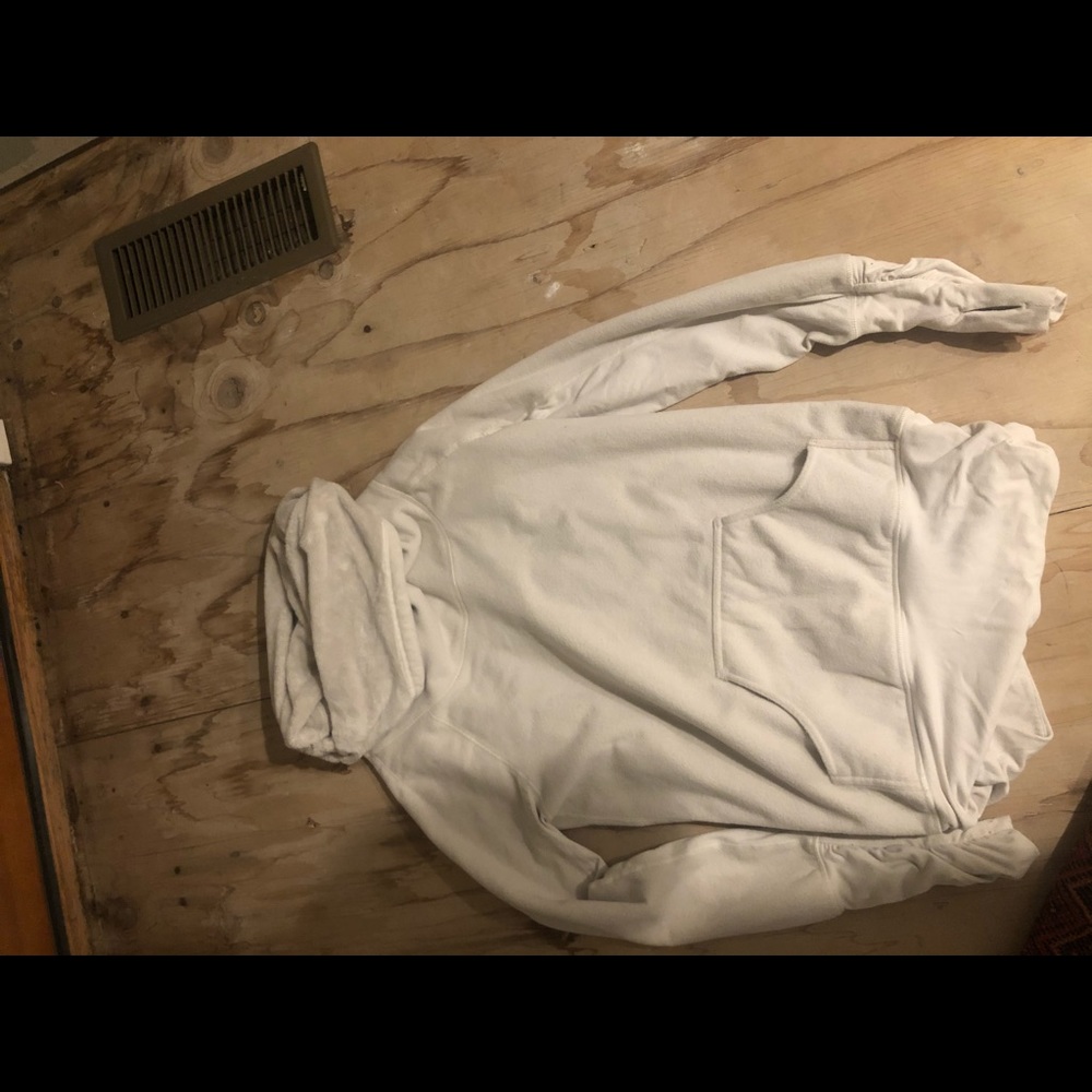 White sweatshirt.
